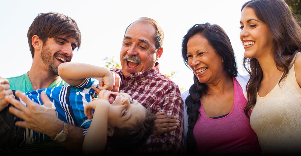 Happy family with laughing child